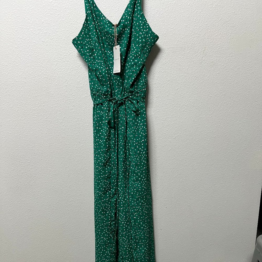 Lightweight Jumpsuit with tie at the waist, and smocking in the back.